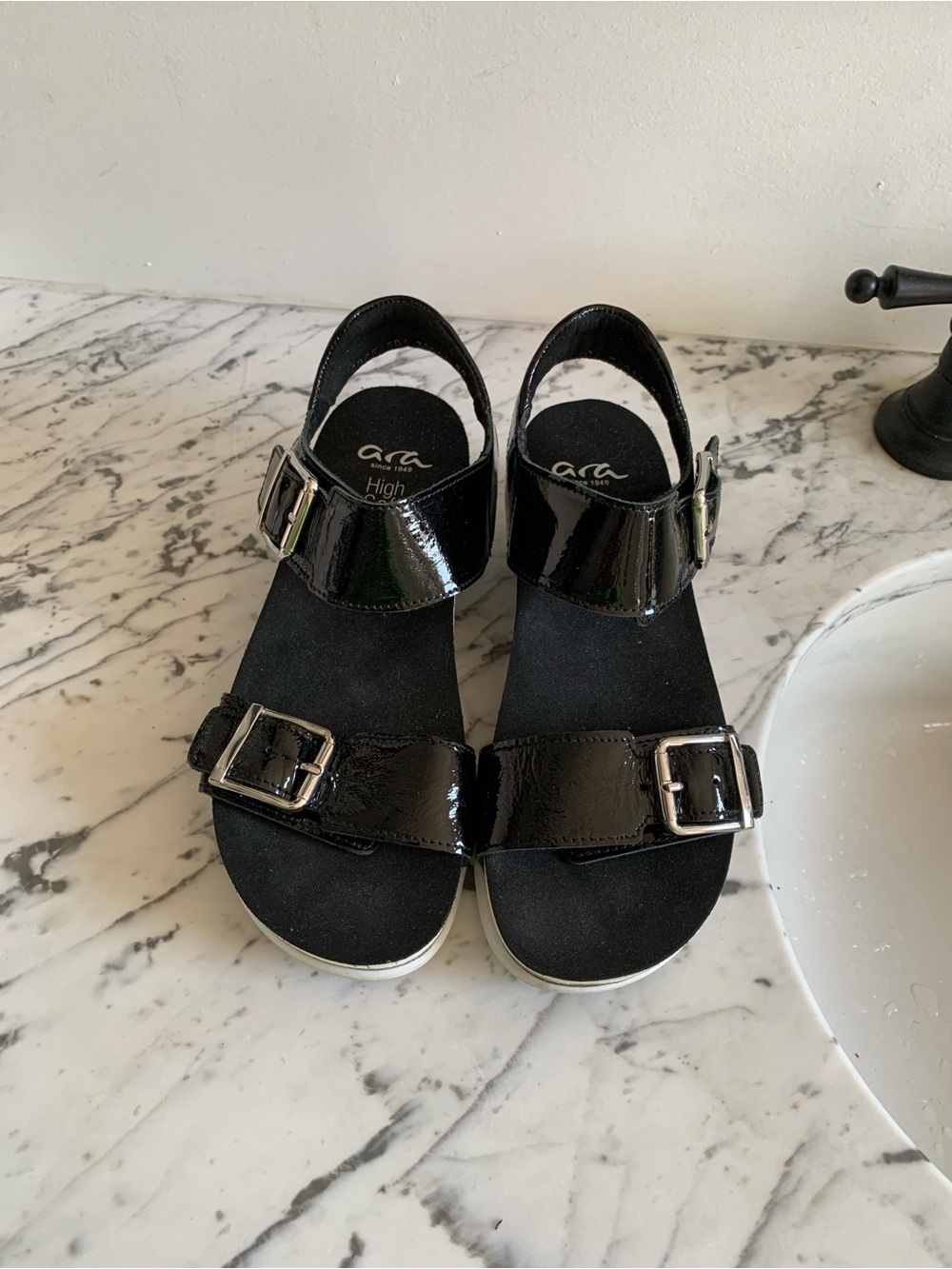 Ara Woman’s Black Patent Buckle Sandals